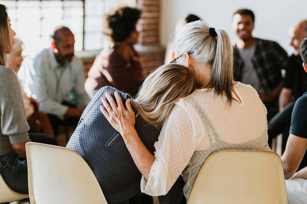 People participating in group activities for addiction treatment
