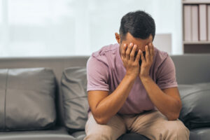 Man wondering, "Can depression cause mood swings?"